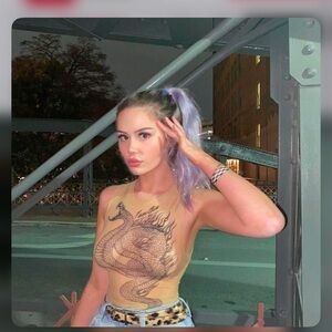 I am Gia snake print top